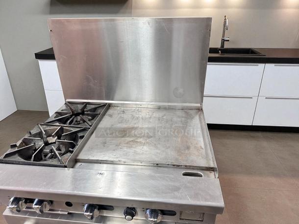 Southbend X4601DD 36" gas range with 2 burners and 24" griddle, natural gas, tested and fully working, excellent condition.