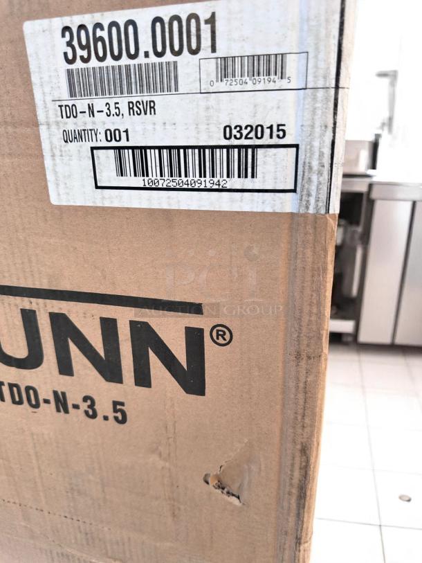 Brand new BUNN TDO-N-3.5 iced tea dispenser box, 3.5-gallon, stainless steel, NSF certified, model markings visible.