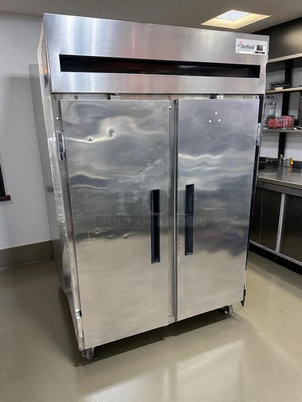 Delfield 6151XL-S two-door reach-in refrigerator, stainless steel, in excellent condition, fully tested, 115V.