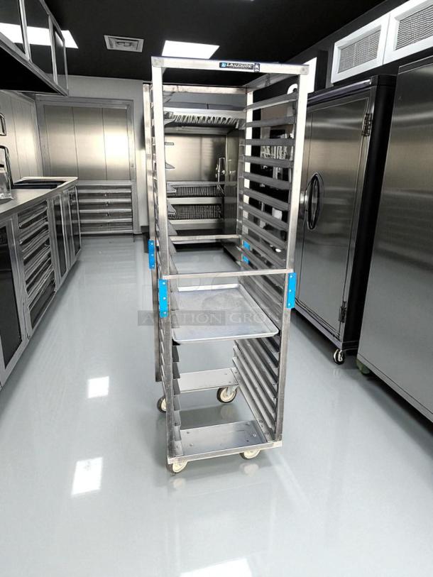 Lakeside 20-pan end load sheet pan rack in excellent condition; aluminum construction, fully tested, on casters.