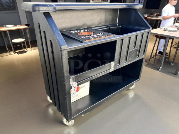 Cambro BAR540DS portable bar, black, excellent condition, features ice sink, storage shelves, tested and fully working.