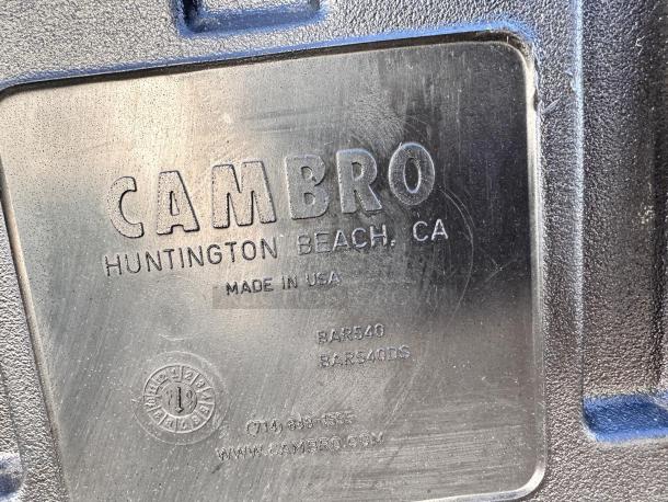 Cambro BAR540DS portable bar with ice sink and storage, black, in excellent condition, label indicates make and model.