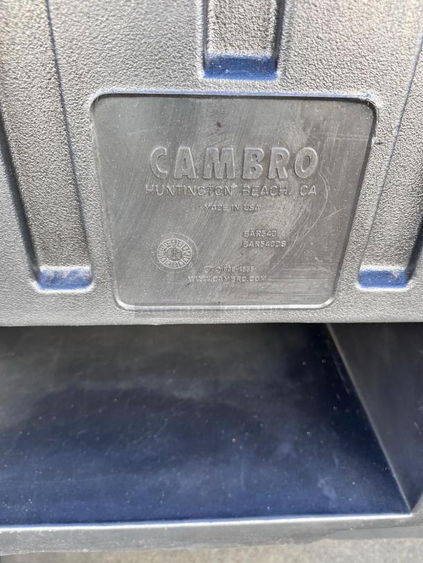 Cambro BAR540DS portable bar, excellent condition, features ice sink and storage, black finish, branded label visible.