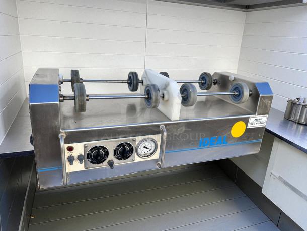 Ideal IU2X25S roller bottle mixing machine in excellent condition, 115V, fully tested. Features control panel and labels indicating brand.