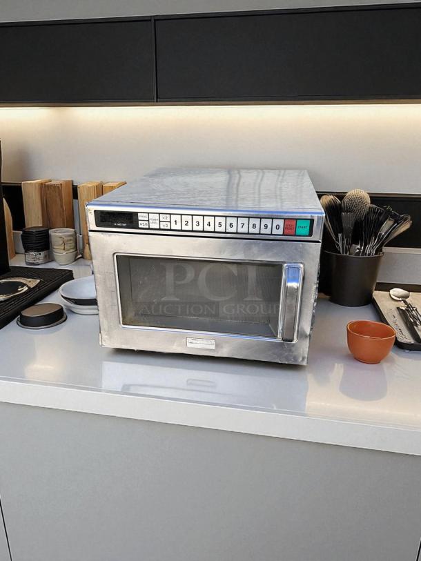 Panasonic commercial microwave, heavy-duty stainless steel, excellent condition, fully tested and working, keypad controls.