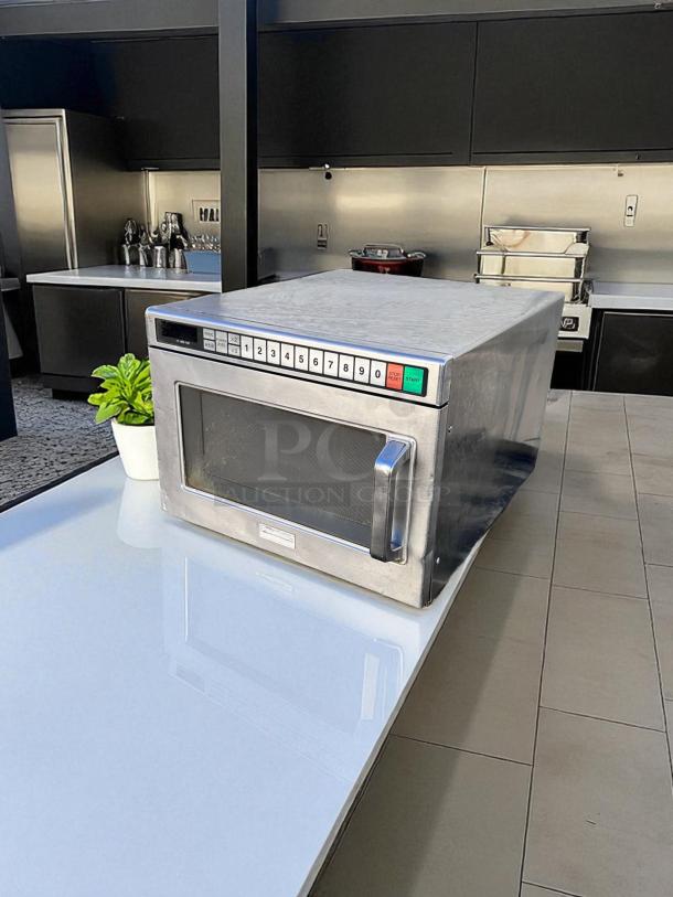 Panasonic commercial microwave, excellent condition, heavy-duty stainless steel, with numeric keypad, fully tested.