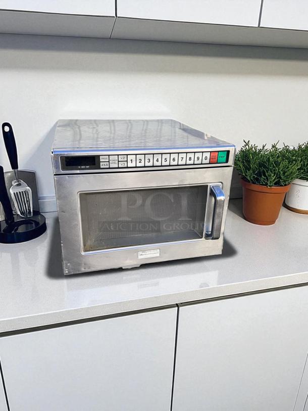 Panasonic commercial microwave in excellent condition, heavy-duty stainless steel, tested and fully functional, numeric keypad.