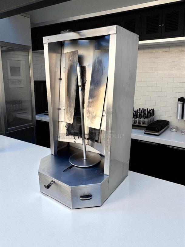 Autodoner 3PG vertical broiler shawarma machine in excellent condition, natural gas-powered, fully tested and working.