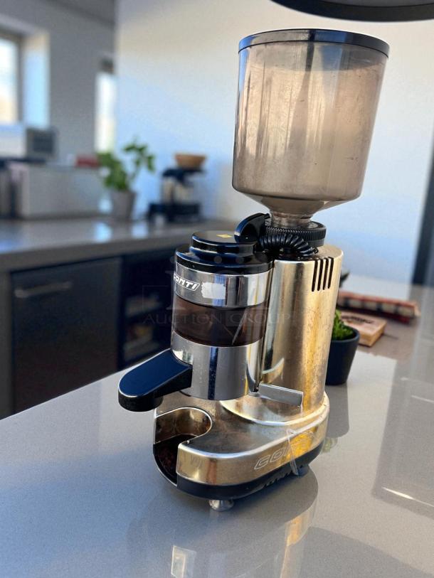 Conti RR45 commercial coffee grinder in excellent condition, 110V, chrome finish, visible Conti label, fully tested and working.