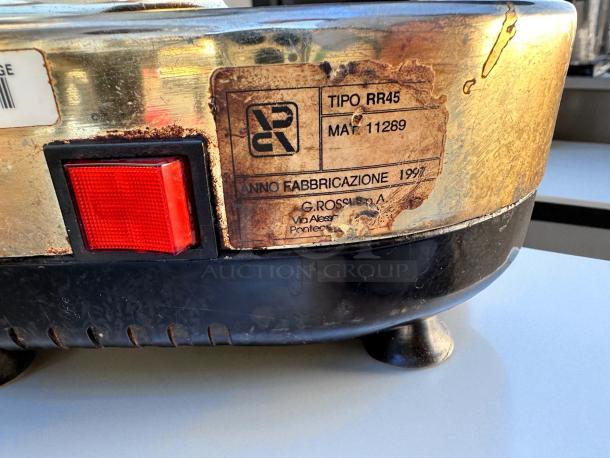 Conti RR45 commercial coffee grinder in excellent condition, fully tested, 110V. Features a visible label indicating model and manufacturing year.