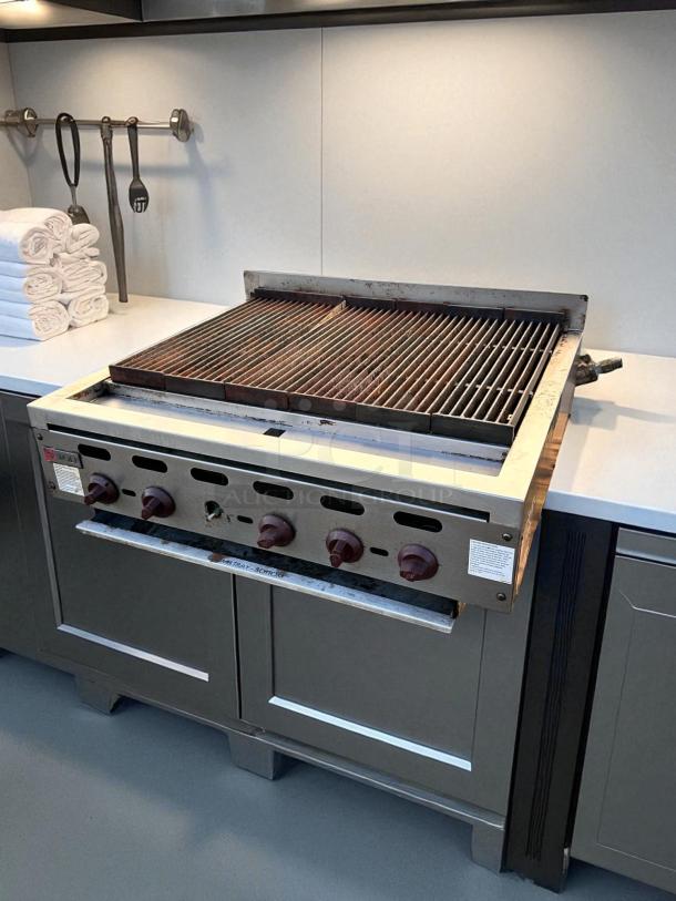 Wolf ACB36-101 36" gas charbroiler in outstanding condition, natural gas, fully tested, with control knobs and grates visible.