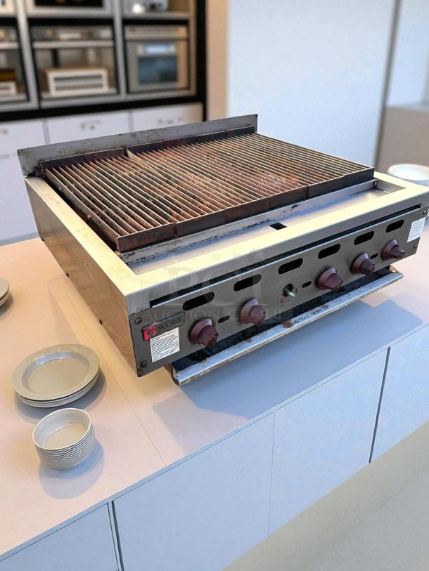 Wolf ACB36-101 36" gas charbroiler in outstanding condition, natural gas, fully tested, sturdy knobs, clean grill surface.