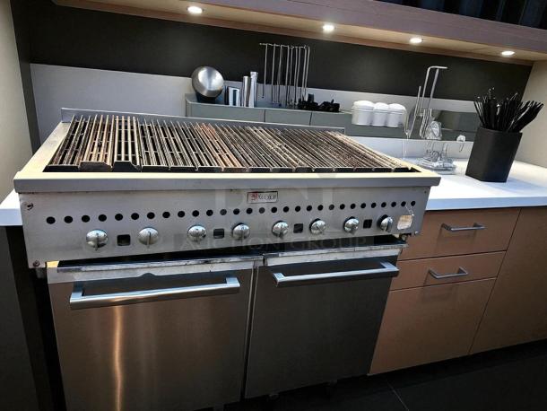 Wolf 48" gas countertop charbroiler in excellent condition, stainless steel, fully tested and working, with control knobs.