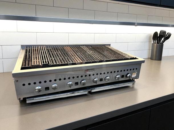 Wolf Radiant Charbroiler, 48" gas countertop grill, excellent condition, fully tested, stainless steel, six control knobs.