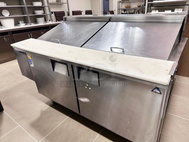 True TSSU-60-16 refrigerated prep table, 60", stainless steel, excellent condition, clean cutting board, tested working.