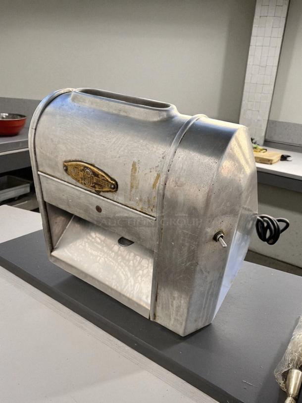 Landers Model 500 steak tenderizer machine, excellent condition, fully tested, metal exterior, visible brand label.