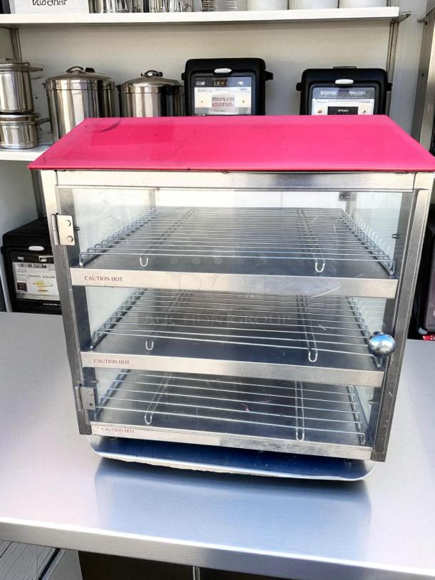 Fusion 513FC countertop food warmer display cabinet in excellent condition, glass doors, "Caution Hot" labels, 120V, tested working.