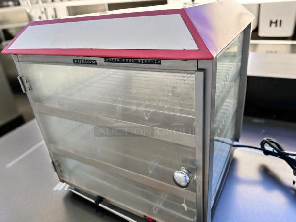 Fusion 513FC countertop food warmer display cabinet in excellent condition, 120V, glass and metal design, fully tested.