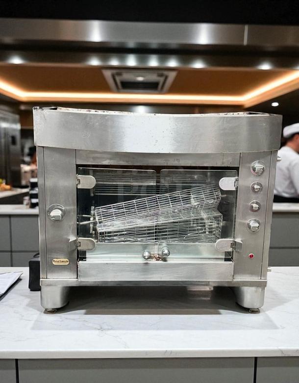 Excellent condition Rotisol 950-2 gas rotisserie oven, natural gas, fully tested, stainless steel, visible control knobs.