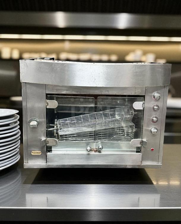 Rotisol 950-2 gas rotisserie oven, stainless steel, excellent condition, natural gas, fully tested, visible control panel.