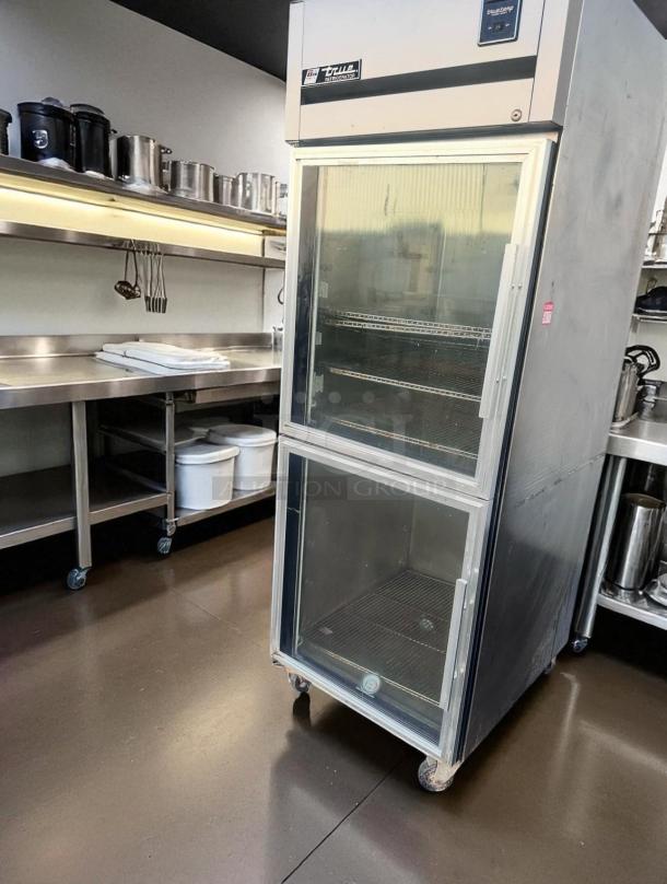 True TR1R-2HG single section reach-in refrigerator with glass doors, excellent condition, 115V, tested and working.