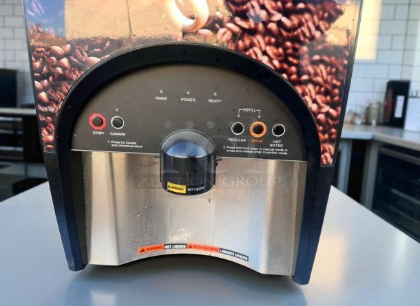 BUNN LCA-2 LP Aspen coffee dispenser in excellent condition; fully tested. Features regular, decaf, hot water options.