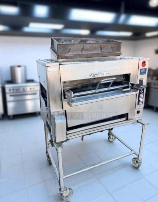 Duke FBB-NC-120 gas conveyor broiler in excellent condition, Burger King model, fully tested and working, on casters.