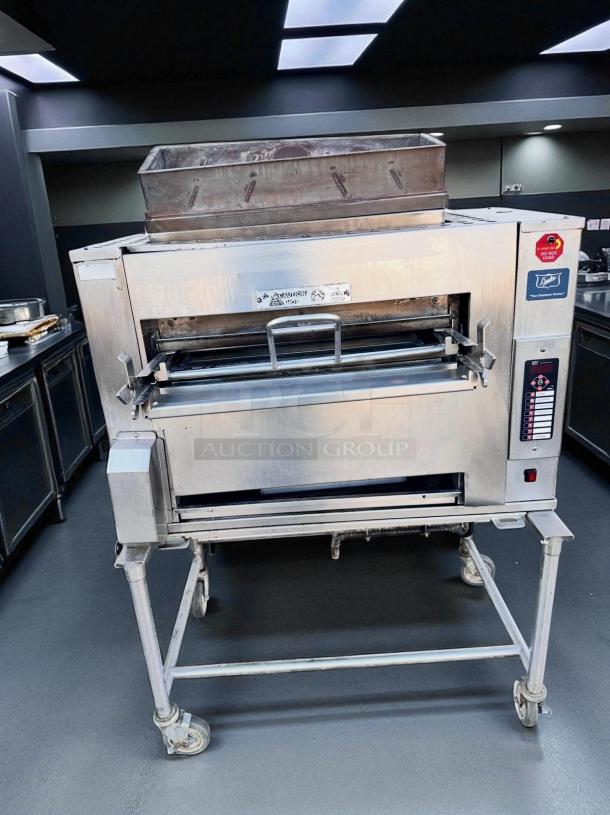 Duke FBB-NC-120 Gas Conveyor Broiler in excellent condition, tested and working, with visible control panel and caution labels.