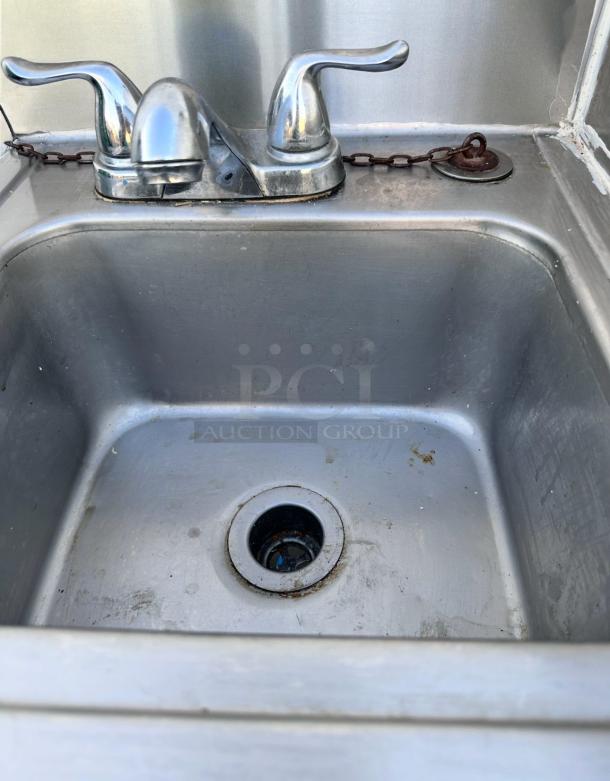 Stainless steel drop-in hand sink with dual-handle faucet, 18.5"x17.5"x18.5", excellent condition, ready to use.