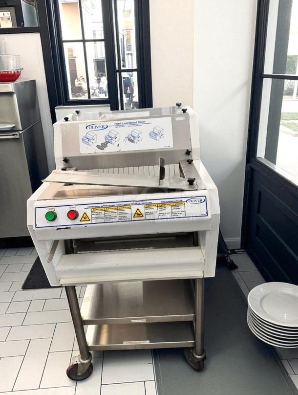 Oliver 702N Front Load Bread Slicer, excellent condition, 115V, tested, fully functional, visible displays and controls.