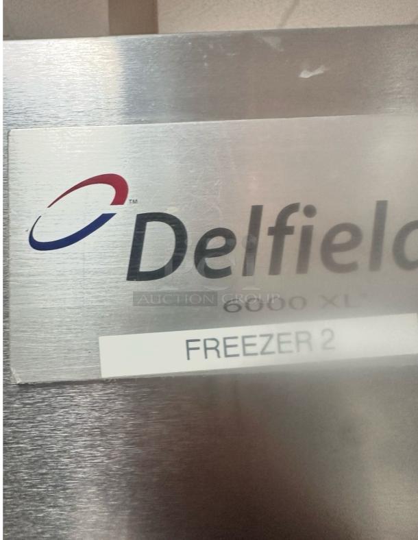 Delfield 6151XL-S reach-in freezer, 52", two-door, stainless steel, excellent condition, model label visible.