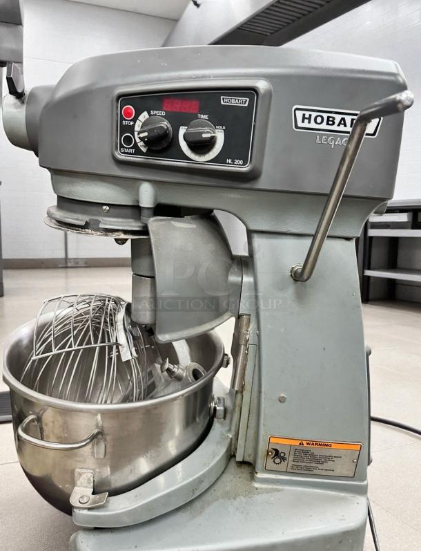 Hobart HL200 Planetary Mixer, 20 Qt, excellent condition, 100-120V, fully tested, mixer attachments and controls visible, Hobart logo.