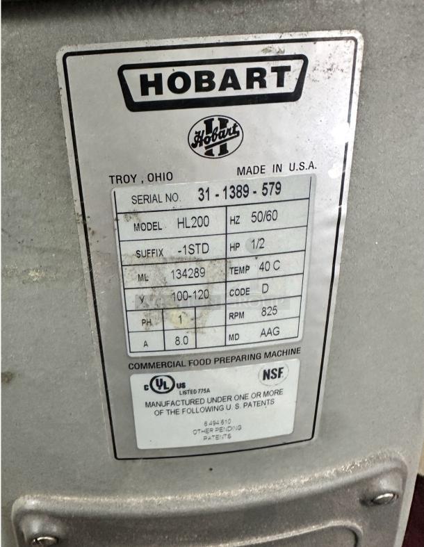 Hobart HL200 mixer label showing model, serial number, voltage, and certification details. NSF and UL listed.