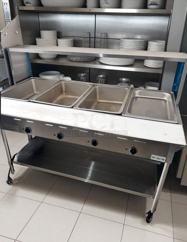 Avantco 4-Well Steam Table, excellent condition, dry heat, fully tested. Stainless steel, labeled "Dry Heating."