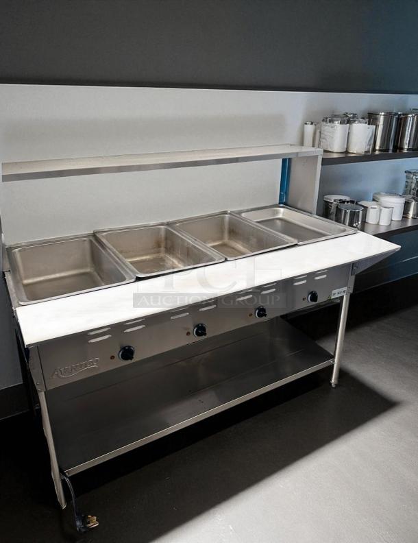 Avantco 4-Well Steam Table, Excellent Condition, Dry Heat, Fully Tested, Stainless Steel, Control Knobs Visible.