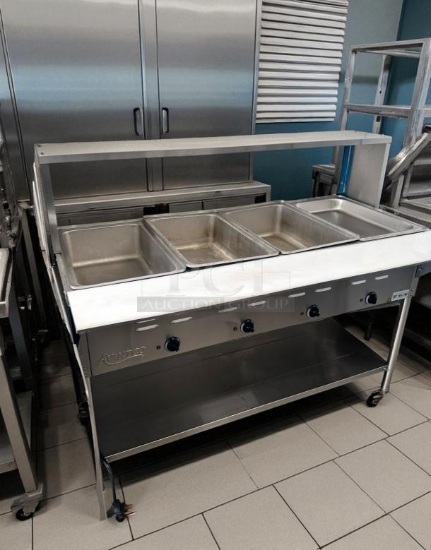 Avantco 4-Well Dry Heat Steam Table in excellent condition. Fully tested, working. Features control knobs and storage shelf.