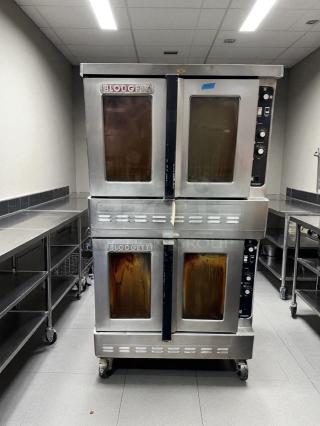 Blodgett DFG-200 double stack gas convection oven, excellent condition, natural gas, tested and working, in a commercial kitchen.