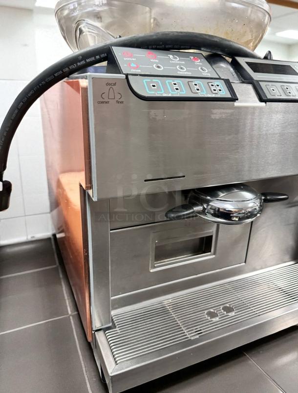 Rancilio Egro One Touch espresso machine, excellent condition, fully automatic, bean-to-cup, controls visible, stainless steel.