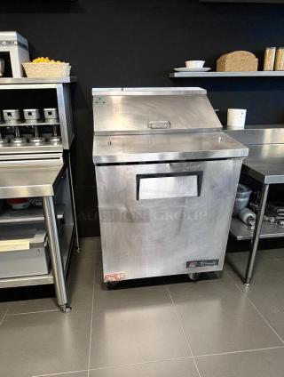 True TSSU-27-08 27" one-door sandwich/salad prep table in excellent condition, stainless steel, tested, branded label shown.