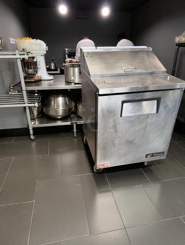 True TSSU-27-08 sandwich prep table, excellent condition, stainless steel, one-door, 27", 115V, tested and working.