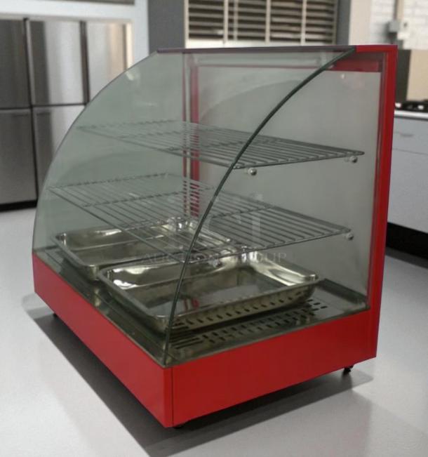 COZOC FW5004-2 countertop food display warmer in excellent condition, 120V, with curved glass front and metal shelves.