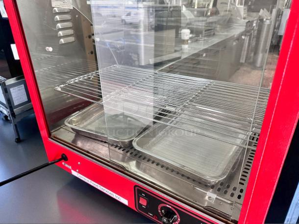 COZOC FW5004-2 food display warmer, excellent condition, red frame, double racks, stainless trays, 120V, fully tested.