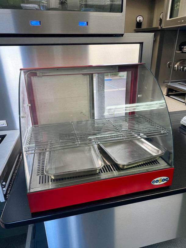 COZOC FW5004-2 countertop food display warmer in excellent condition, 120V, glass front, tested and working, includes trays.