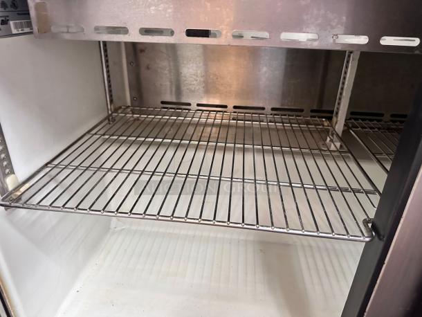 Turbo Air TST-48SD sandwich prep table interior, stainless steel shelves, excellent condition, fully tested and working.