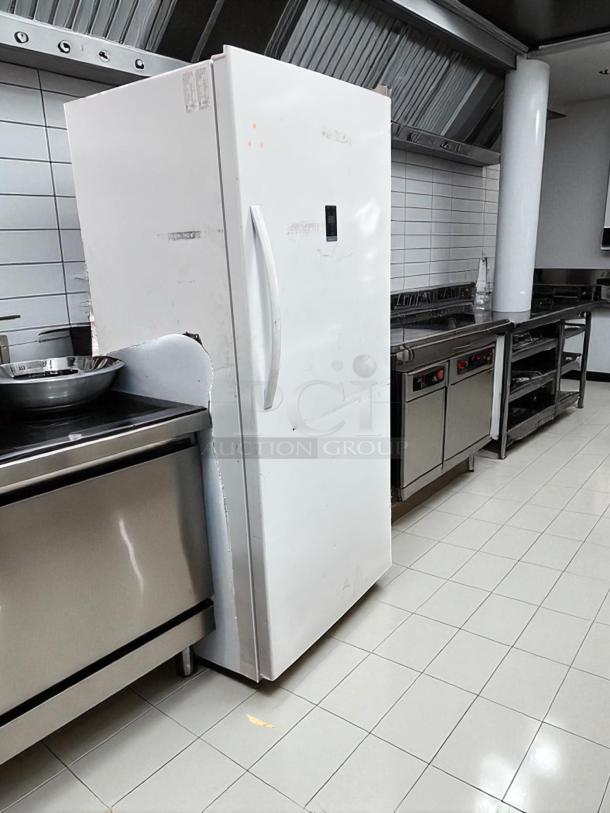 Insignia NS-UZ21WH0 21 Cu. Ft. Upright Freezer in white, excellent condition, fully tested, model label visible.
