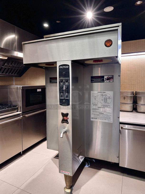 FETCO CBS-2042e Twin Station Commercial Coffee Brewer, stainless steel, fully tested, operational, 240V, visible control panel.