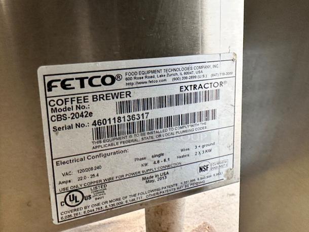 FETCO CBS-2042e commercial coffee brewer, stainless steel, 240V, working condition, model details visible on label.