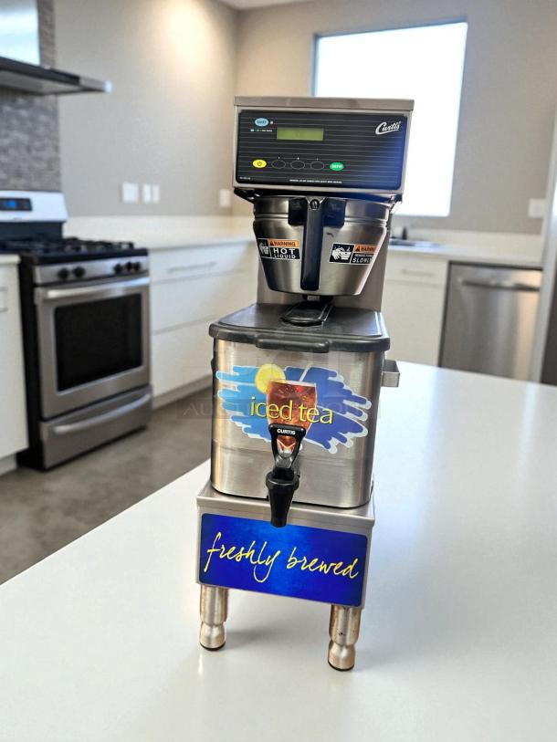 Wilbur Curtis TBP Commercial Iced Tea Brewer, excellent condition, 120V, fully tested, stainless steel, "iced tea" and "freshly brewed" labels.