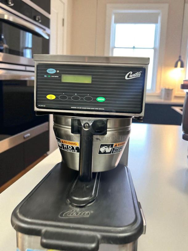 Wilbur Curtis TBP Commercial Iced Tea Brewer, 120V, excellent condition, with control panel and Curtis logo visible.