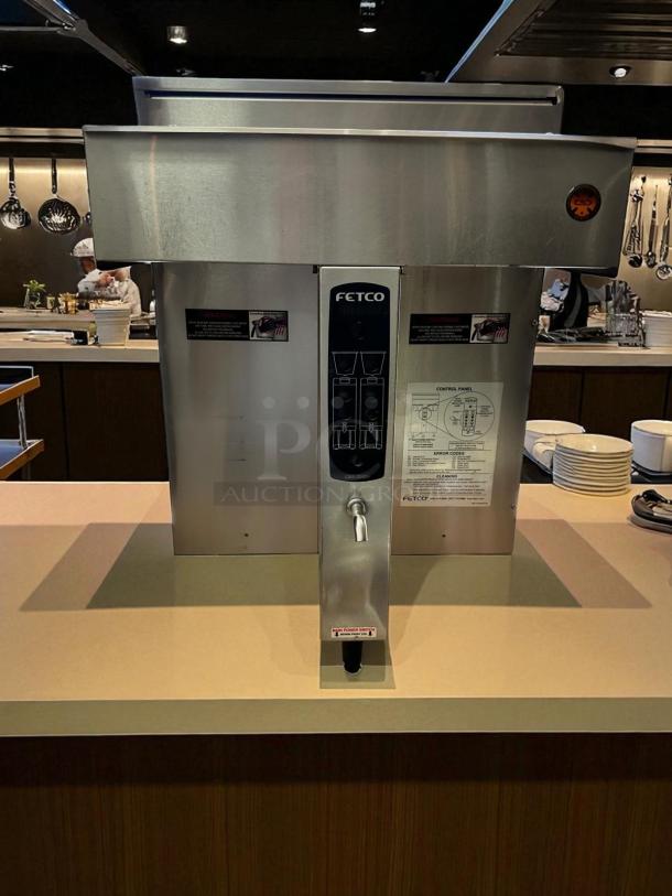 Fetco CBS-2032e dual station coffee brewer in outstanding condition, 220-240V, fully tested and working. Control panel and labels visible.
